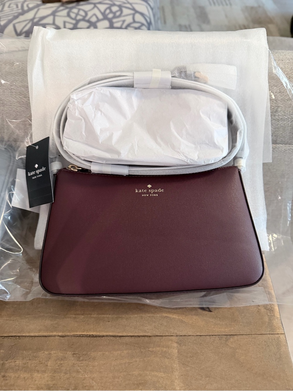 kate spade burgundy leather crossbody with gold logo